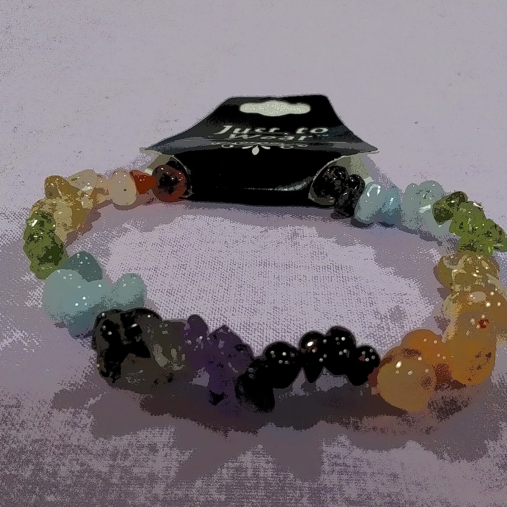 Bracelet with stones that are supposed to promote positivity.